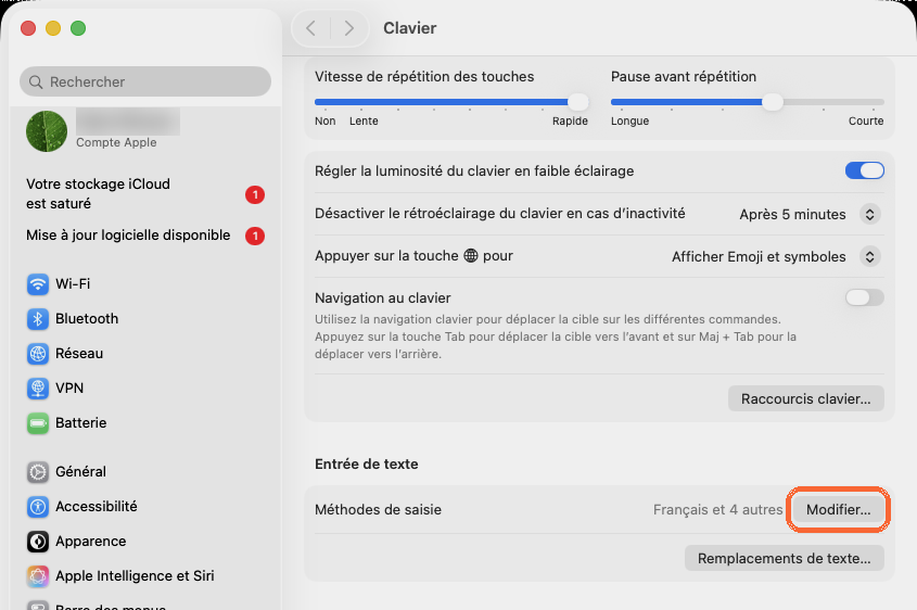 Reglages Systeme Clavier sur Mac : le bouton Modifier de la section Entree de texte surligne en orange